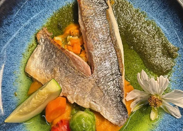Restaurant Au Parc Des Cigognes מלון